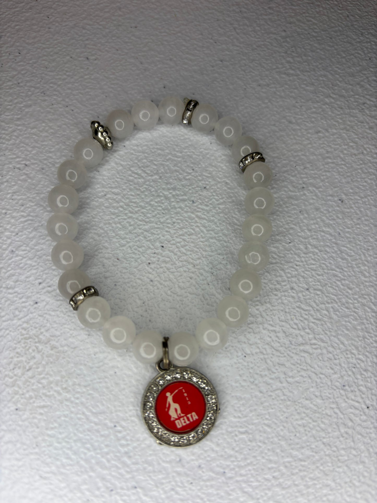 Delta charm bracelet
