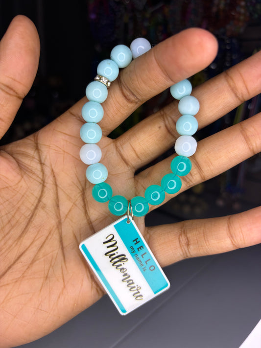 Blue millionaire charm bracelet