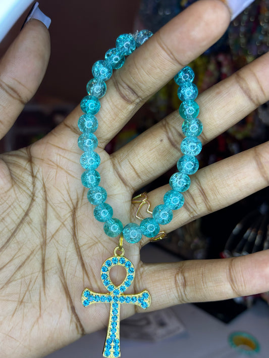 Cross charm bracelet