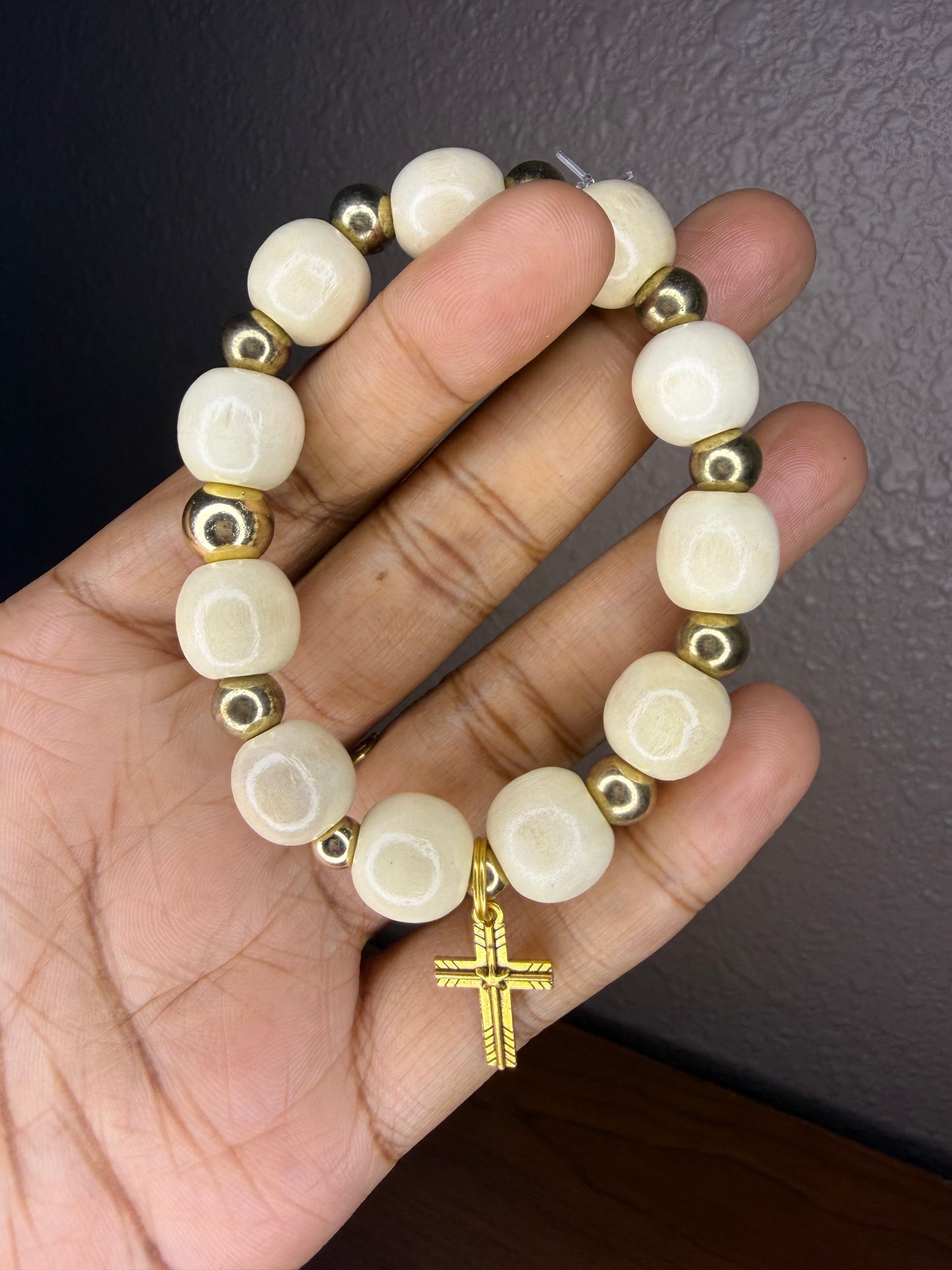 Cross charm bracelet