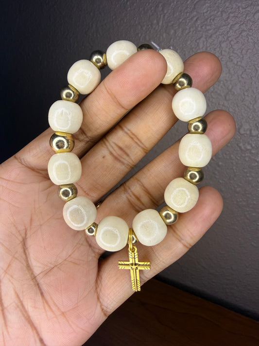 Cross charm bracelet