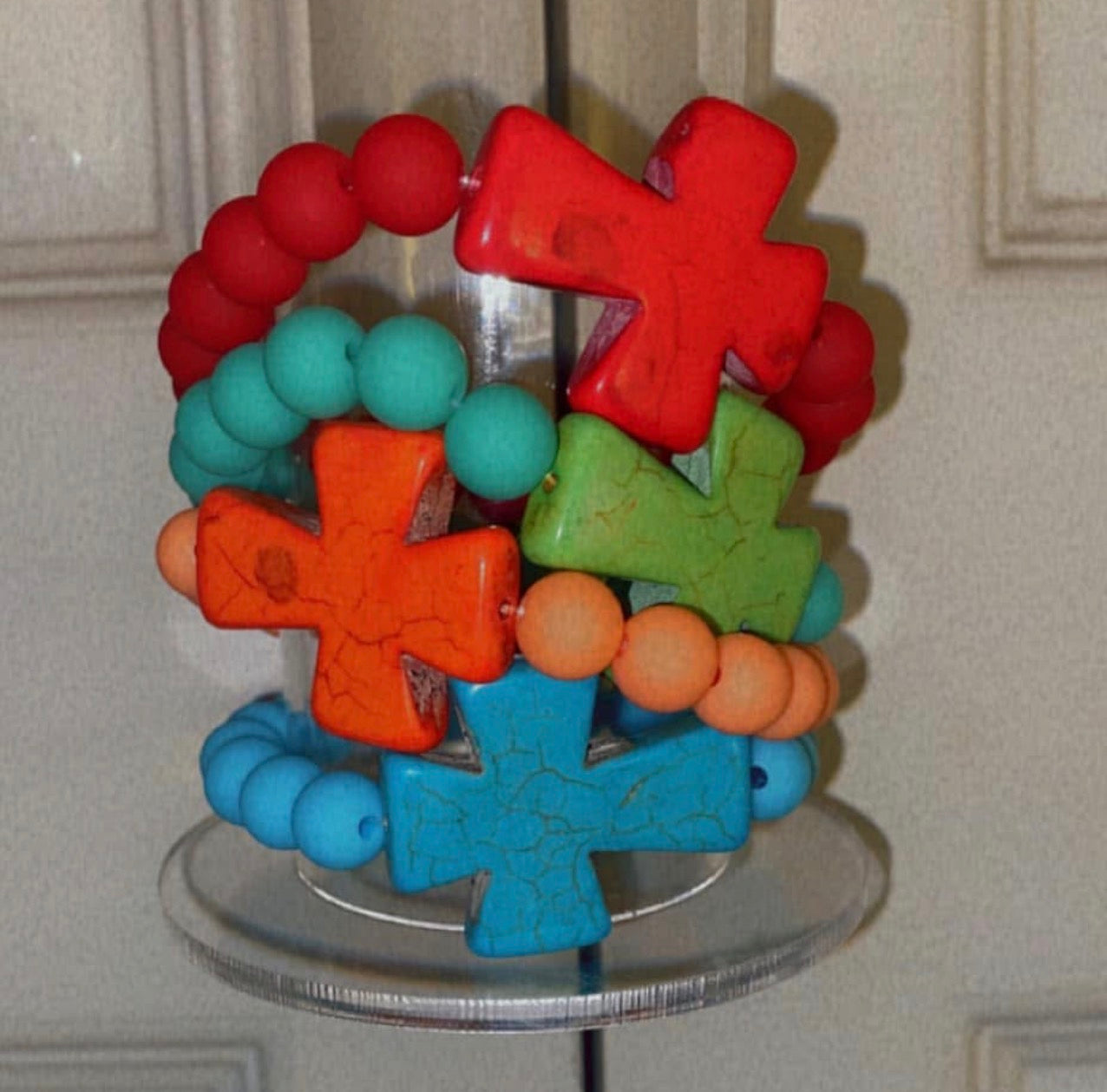 Cross charm bracelets