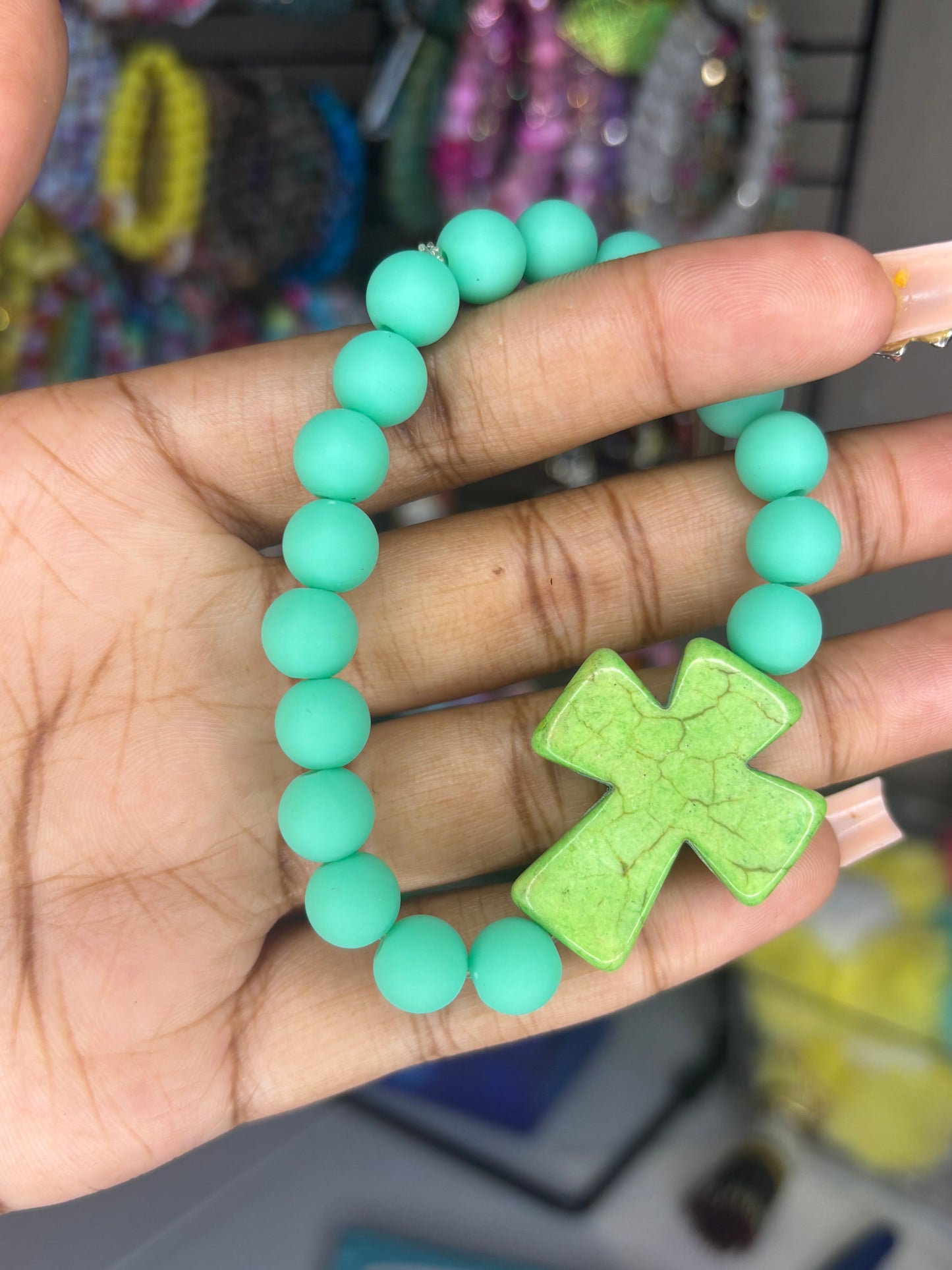 Green cross charm bracelet