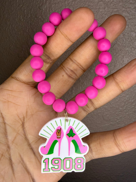 Aka charm bracelet