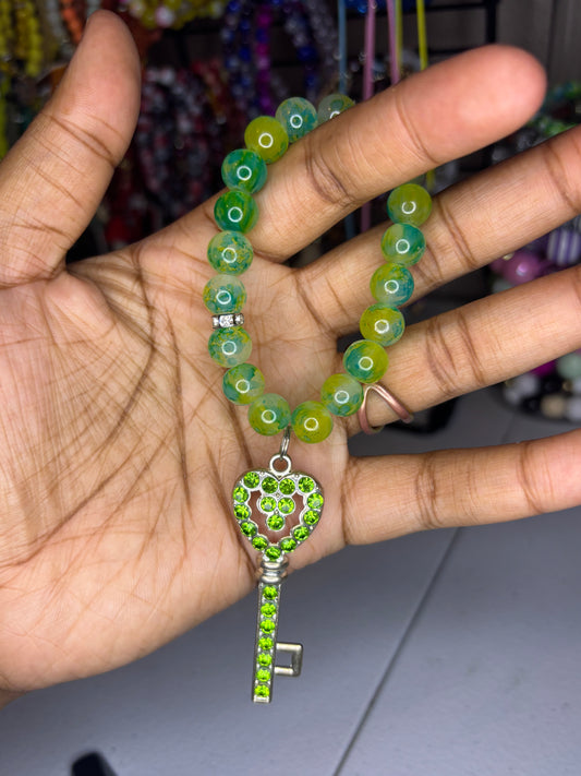 Green charm bracelet