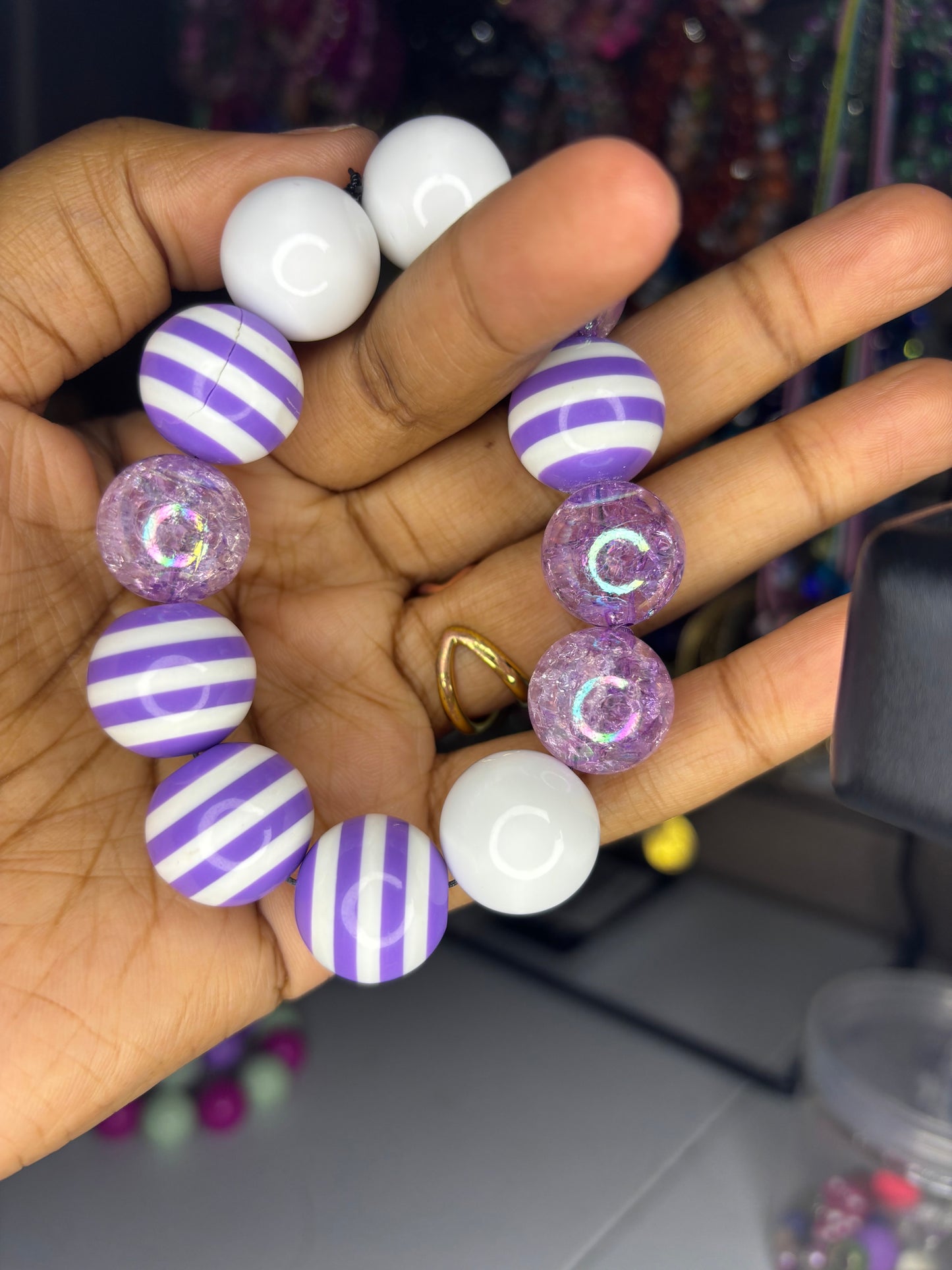 Purple and white beaded bracelet