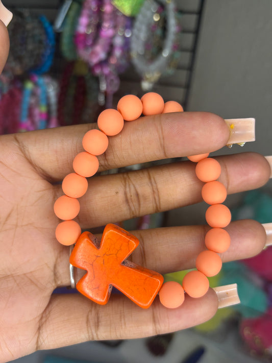 Orange cross charm bracelet