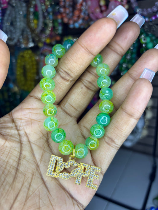Green dope charm bracelet