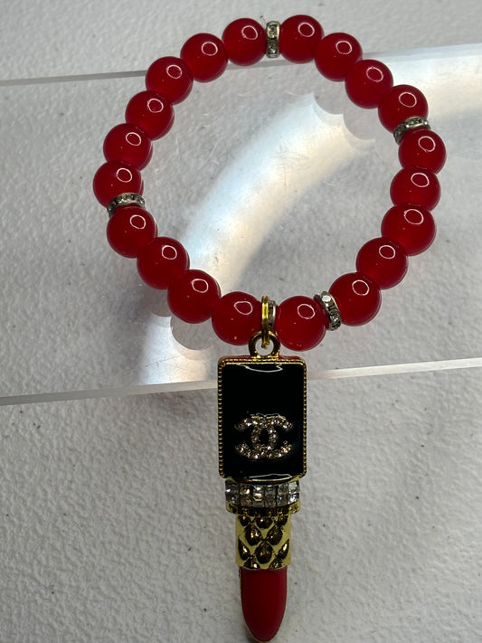 Red Chanel charm bracelet