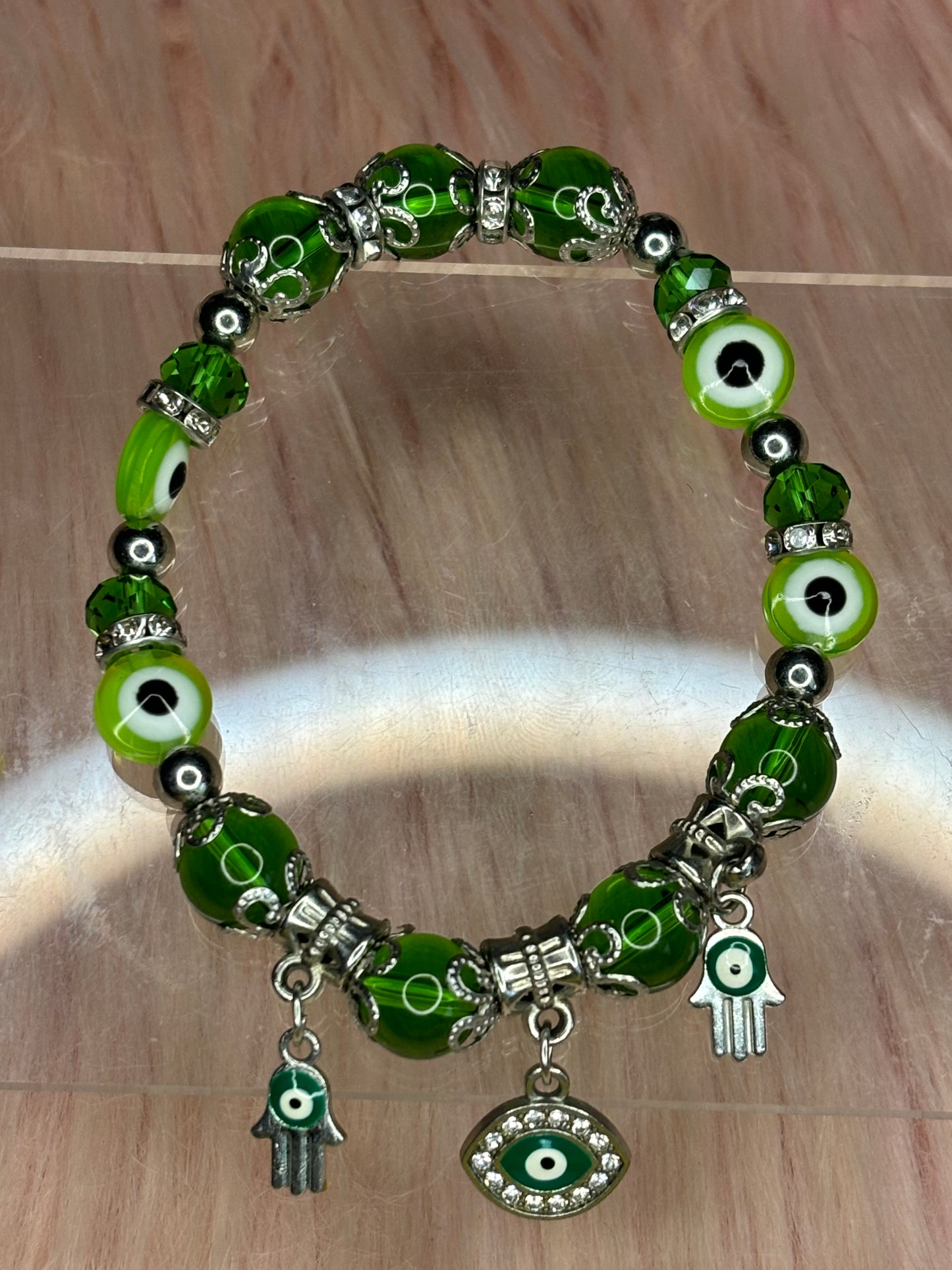 Green devil eye charm bracelet