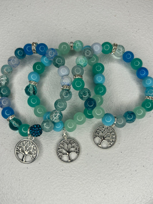 Shades of blue tree of life charm bracelets